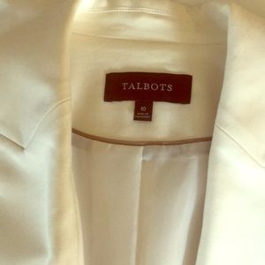 White blazer with gold buttons